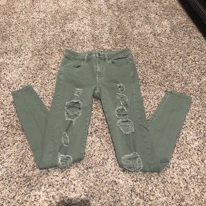 Green American Eagle ripped jeans